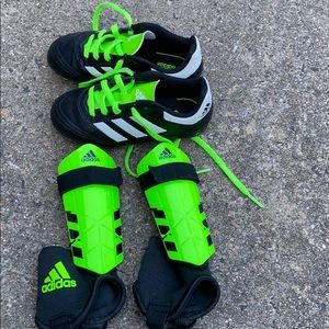 Kids Adidas soccer cleats and shin guards